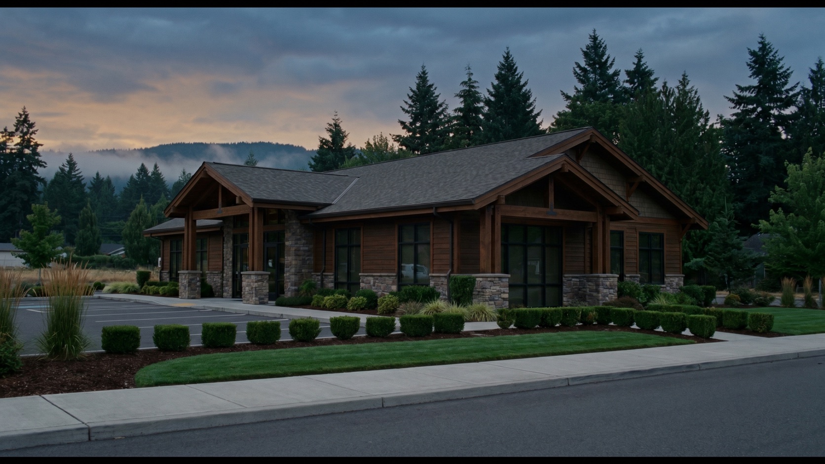 Clean, polished commercial office exterior with fresh landscaping at blue hour in Snohomish